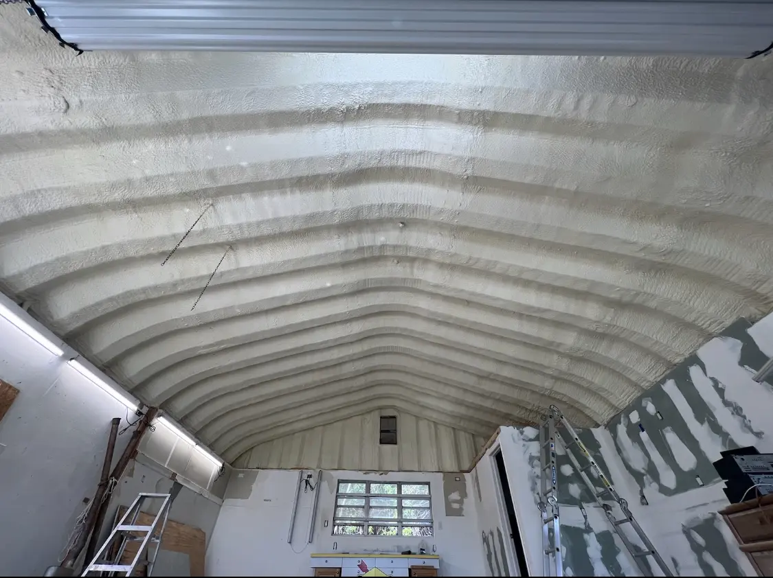Spray polyurethane foam applied to the underside of a metal roof deck in Unionville